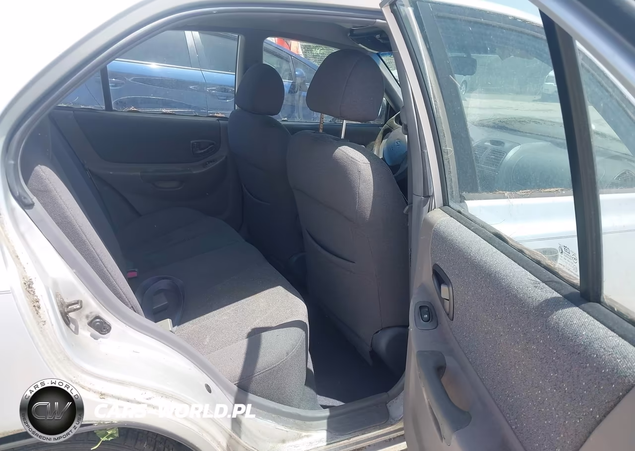 2002 Hyundai Accent Gl VIN:KMHCG45C62U310292 - 8