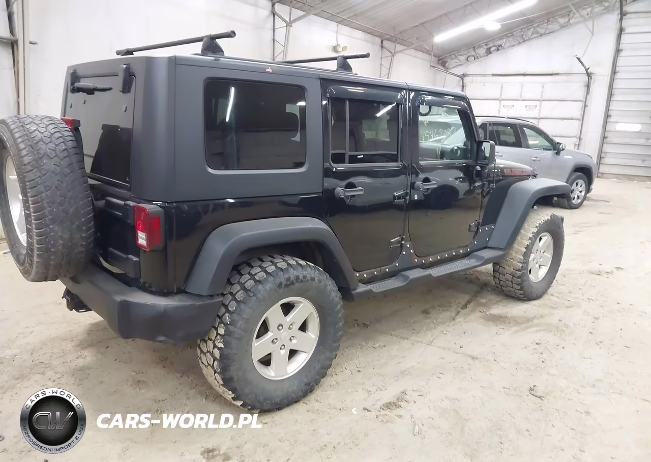2011 Jeep Wrangler Unlimited Sport VIN:1J4BA3H1XBL627546 - 4