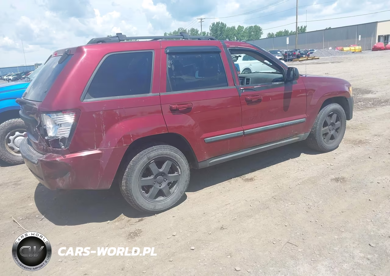 2009 Jeep Grand Cherokee Laredo VIN:1J8GR48K19C510251 - 4