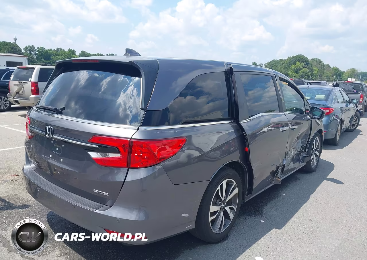 2023 Honda Odyssey Touring VIN:5FNRL6H88PB045646 - 4