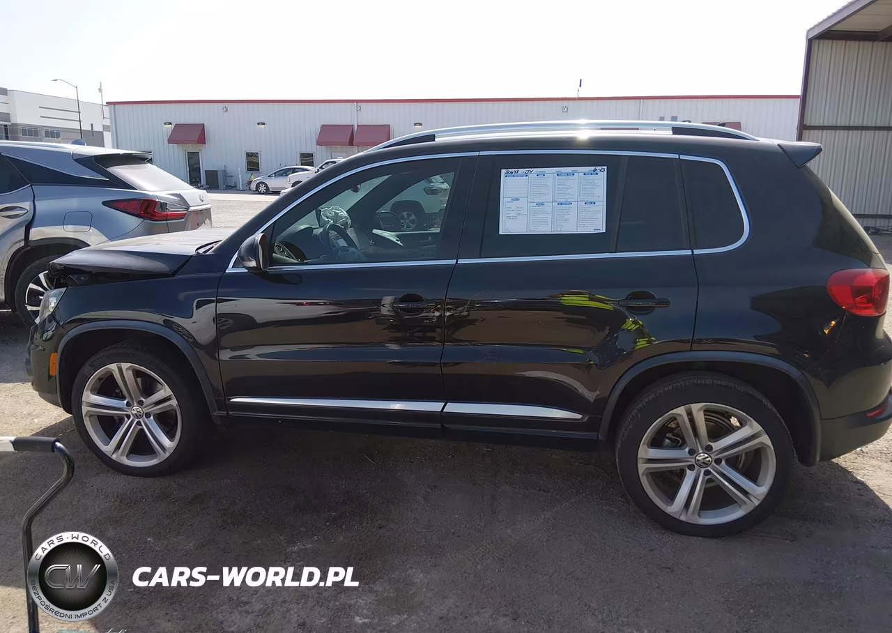2014 Volkswagen Tiguan R-Line VIN:WVGAV3AX4EW537697 - 14