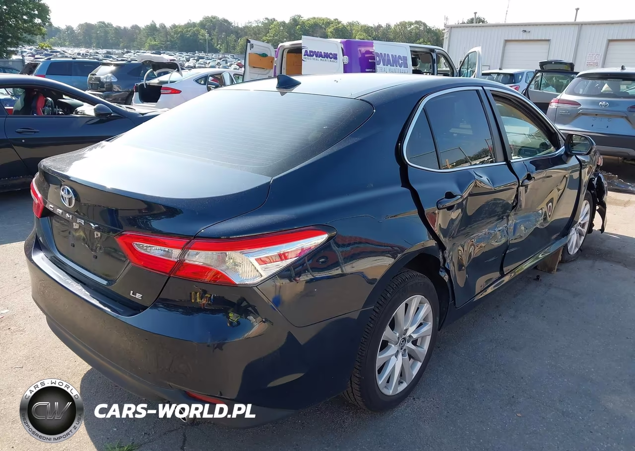 2019 Toyota Camry Le VIN:4T1B11HK5KU702338 - 4