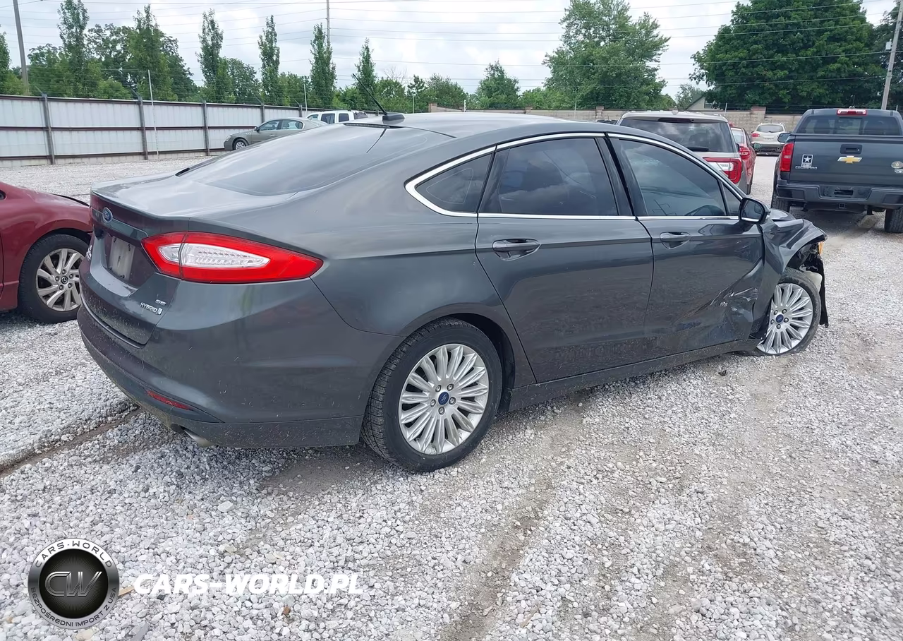 2015 Ford Fusion Hybrid Se VIN:3FA6P0LUXFR300194 - 4