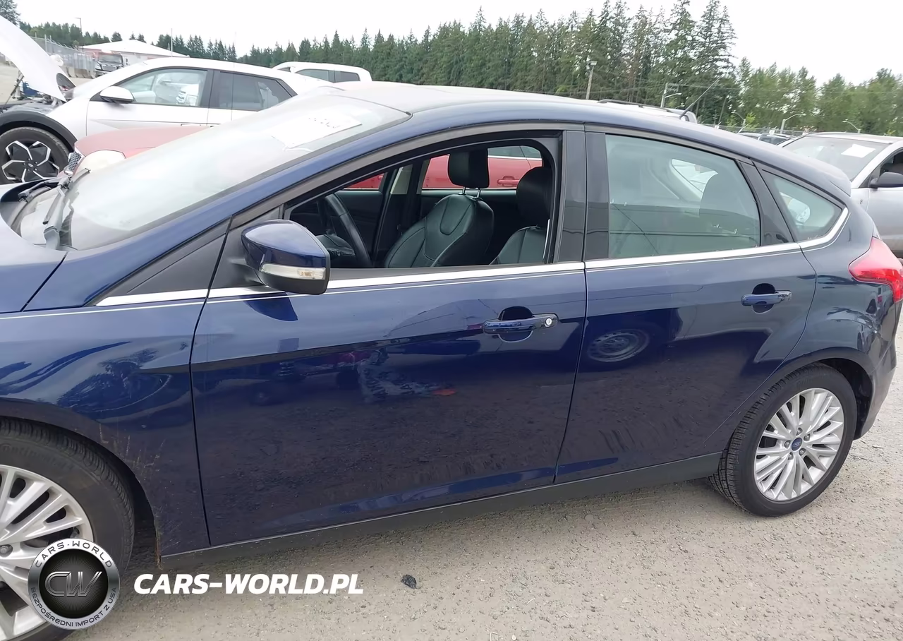 2017 Ford Focus Titanium VIN:1FADP3N28HL312317 - 14