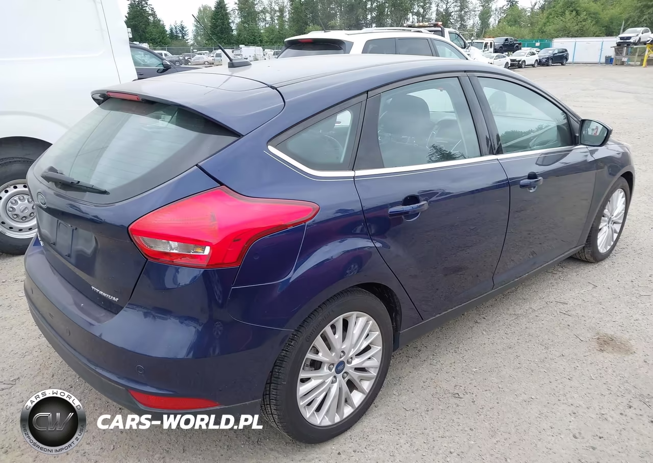 2017 Ford Focus Titanium VIN:1FADP3N28HL312317 - 4