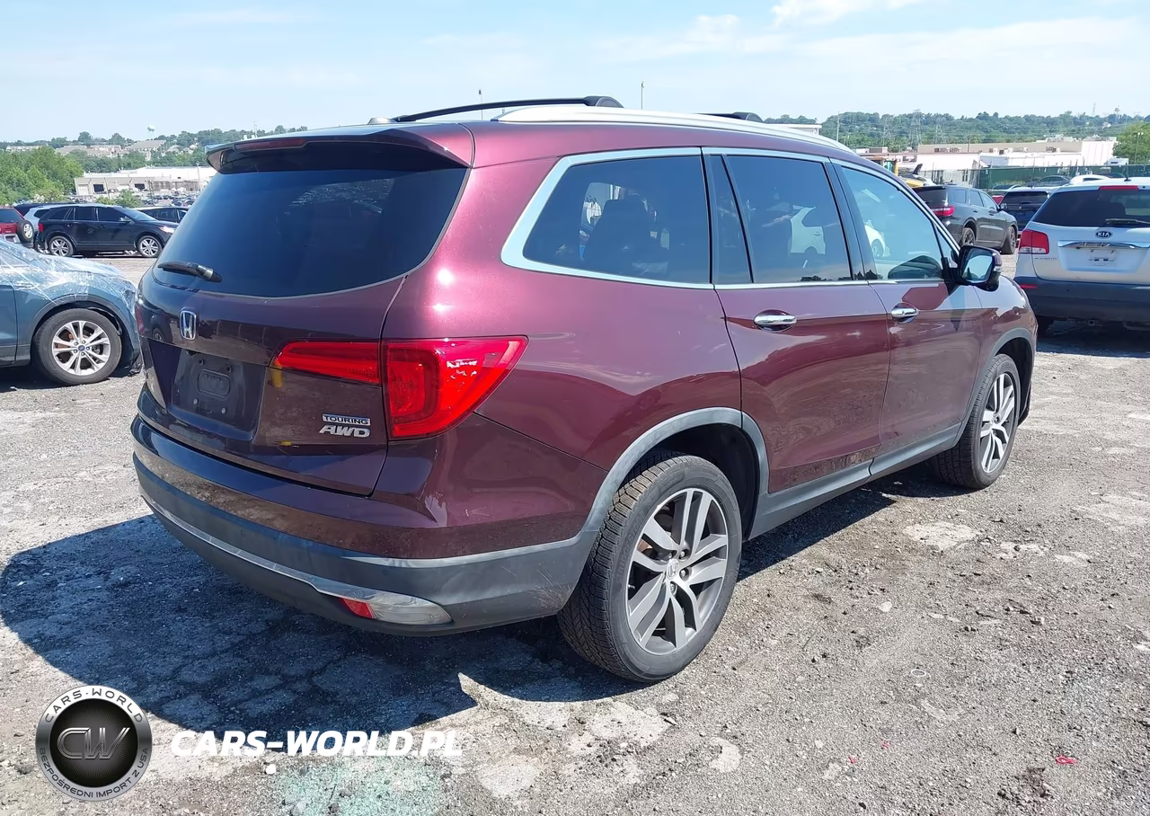 2017 Honda Pilot Touring VIN:5FNYF6H97HB013123 - 4