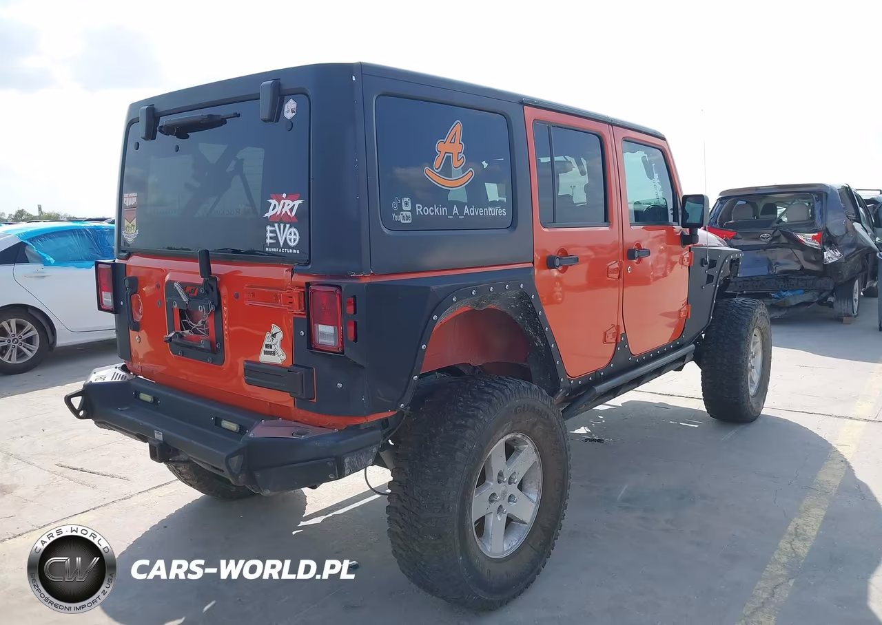2015 Jeep Wrangler Unlimited Rubicon VIN:1C4HJWFG5FL734535 - 4