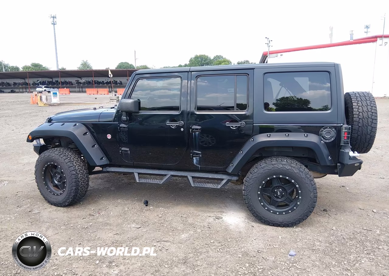 2011 Jeep Wrangler Unlimited Sport VIN:1J4BA3H1XBL507956 - 14