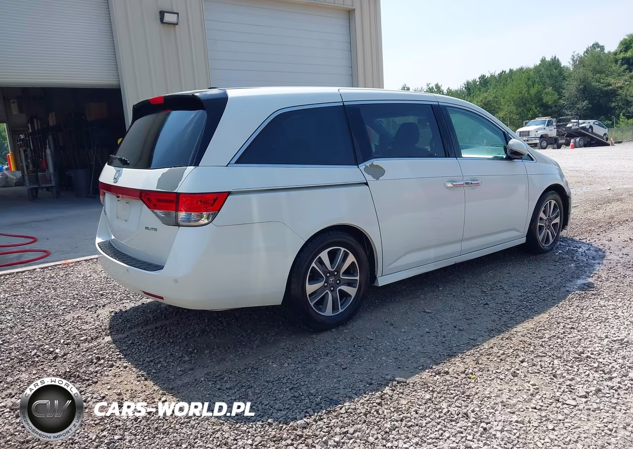 2014 Honda Odyssey Touring-Touring Elite VIN:5FNRL5H98EB123388 - 4