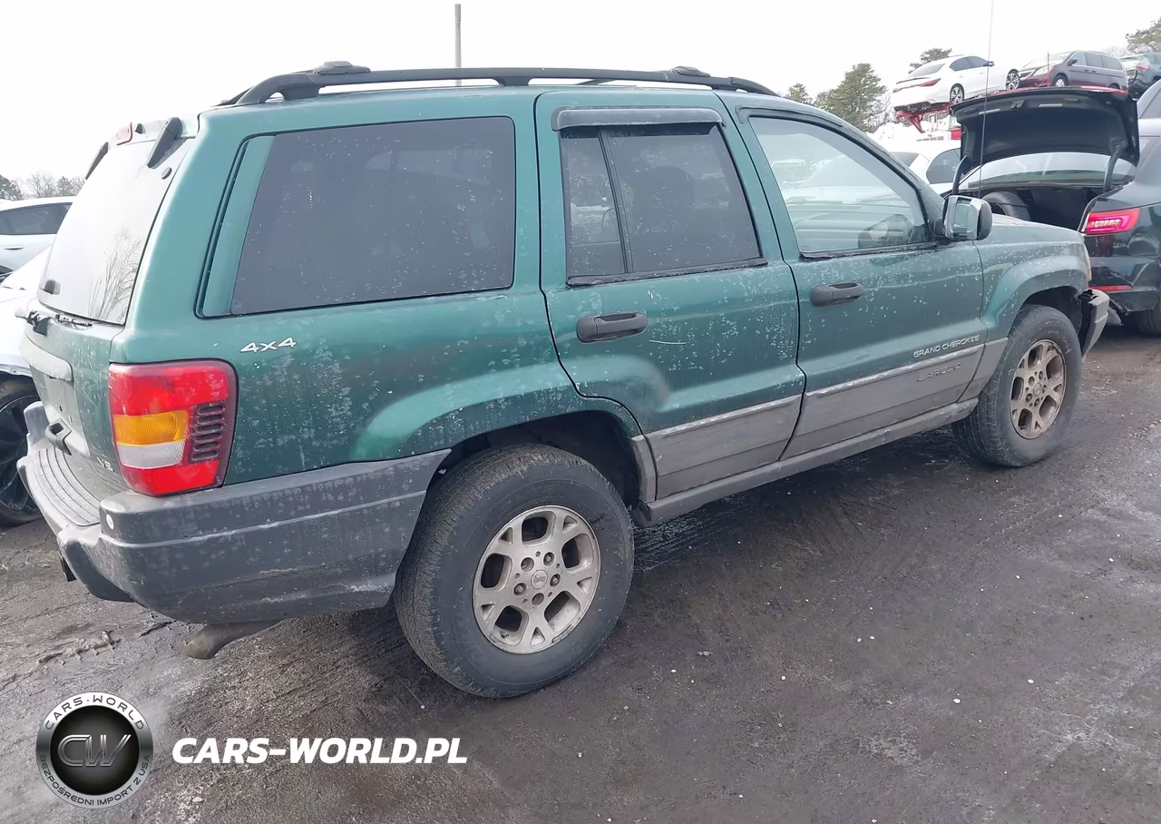 1999 Jeep Grand Cherokee Laredo VIN:1J4GW58N2XC706979 - 4
