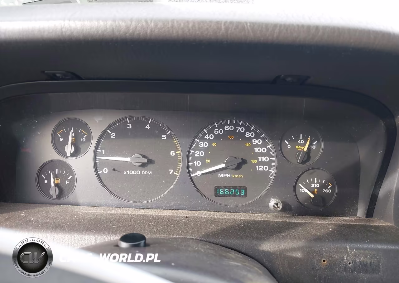 1999 Jeep Grand Cherokee Laredo VIN:1J4GW58N2XC706979 - 7