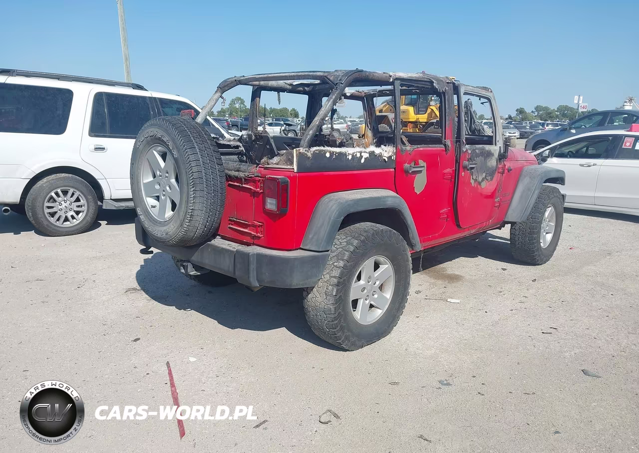 2015 Jeep Wrangler Unlimited Sport VIN:1C4BJWDG0FL565890 - 4