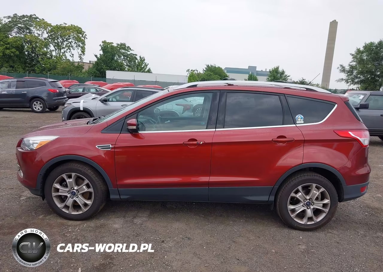 2016 Ford Escape Titanium VIN:1FMCU9J94GUA17207 - 13