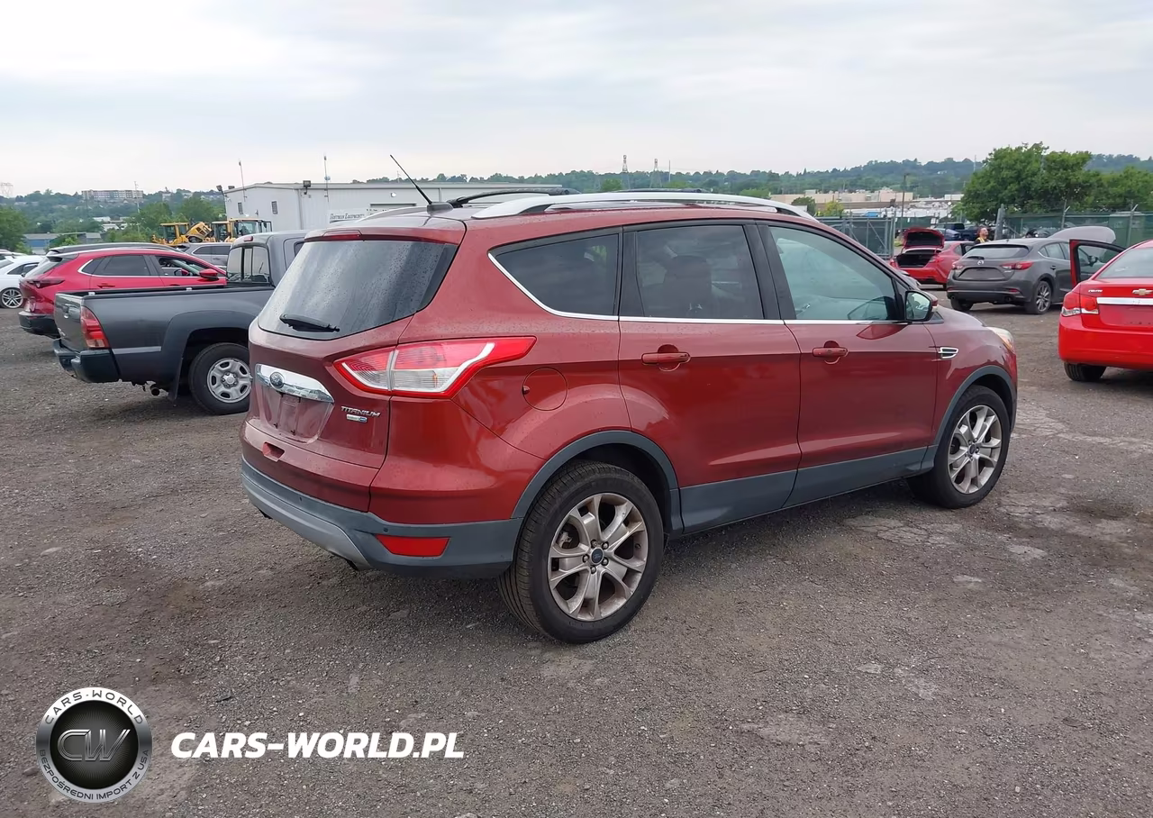 2016 Ford Escape Titanium VIN:1FMCU9J94GUA17207 - 4