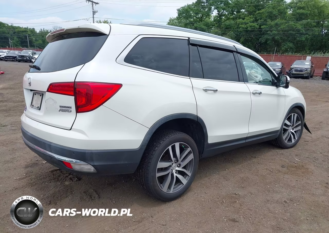 2017 Honda Pilot Touring VIN:5FNYF6H99HB099437 - 4