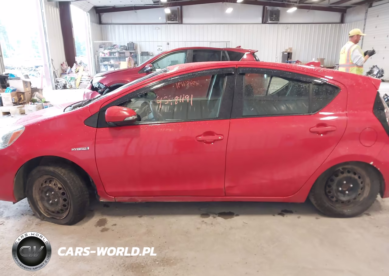 2015 Toyota Prius C Two VIN:JTDKDTB36F1100709 - 14