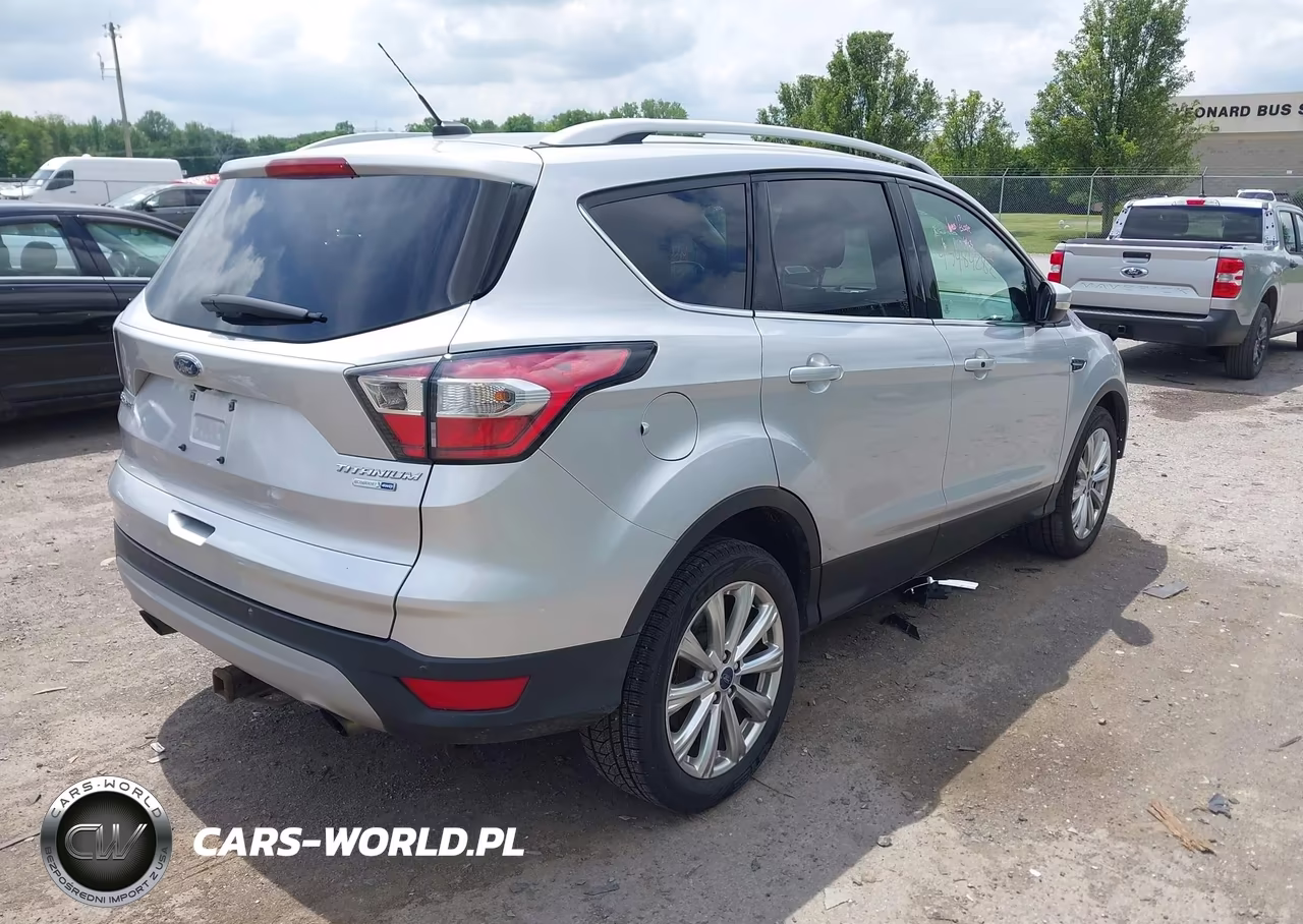 2017 Ford Escape Titanium VIN:1FMCU9J98HUB06568 - 4