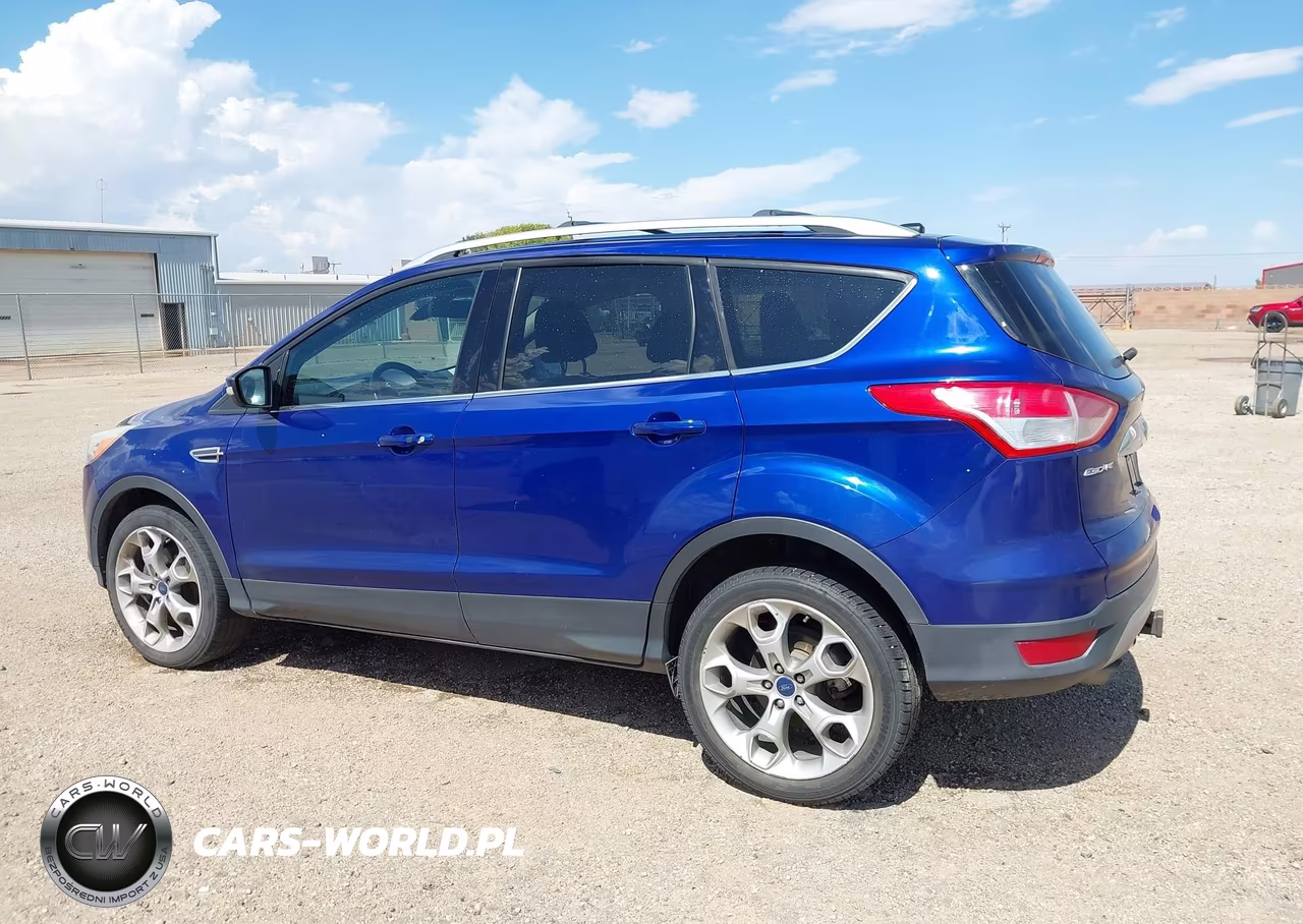 2016 Ford Escape Titanium VIN:1FMCU9J91GUC57816 - 14