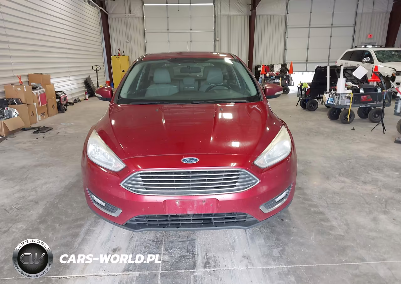 2016 Ford Focus Titanium VIN:1FADP3N27GL339636 - 12