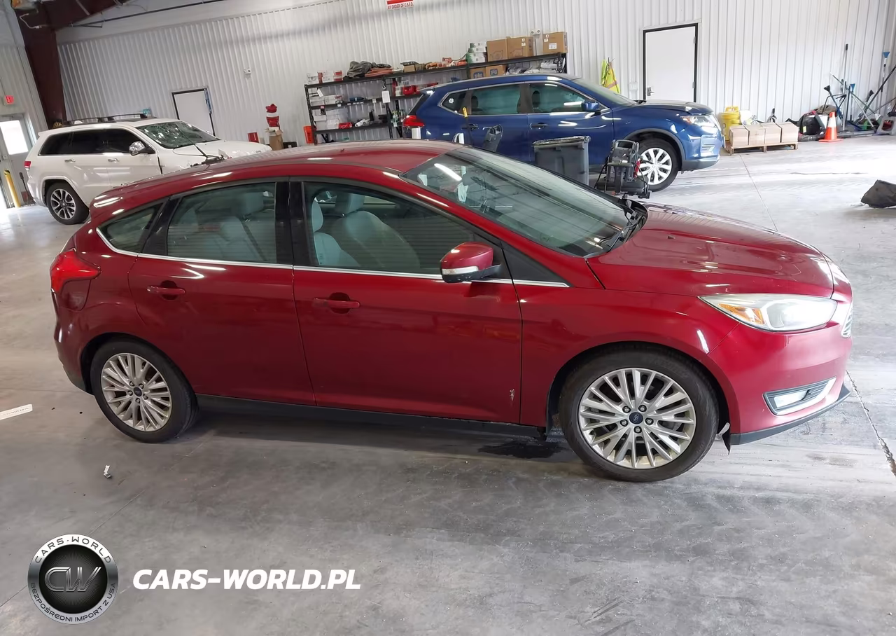 2016 Ford Focus Titanium VIN:1FADP3N27GL339636 - 13