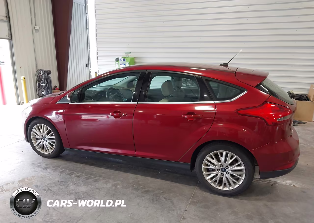 2016 Ford Focus Titanium VIN:1FADP3N27GL339636 - 14