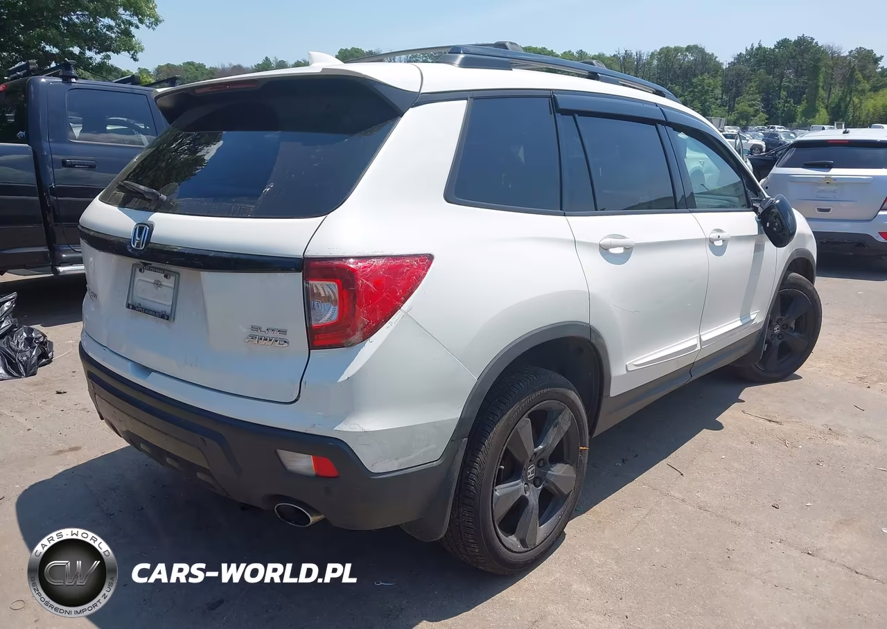 2019 Honda Passport Elite VIN:5FNYF8H04KB003511 - 4