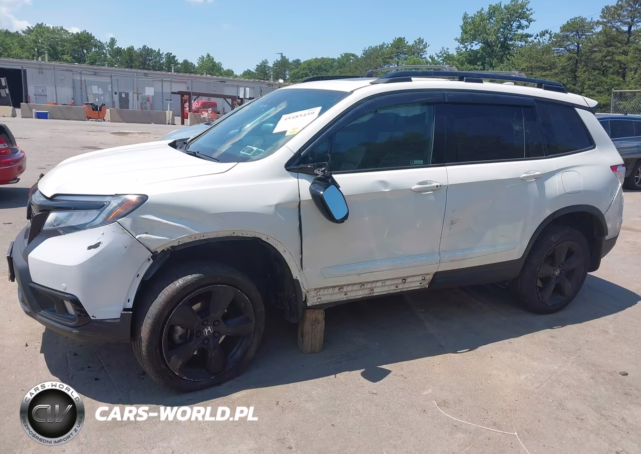 2019 Honda Passport Elite VIN:5FNYF8H04KB003511 - 6