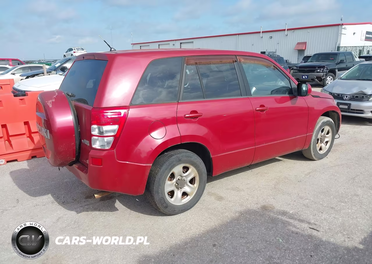 2012 Suzuki Grand Vitara Premium VIN:JS3TE0D22C4100450 - 4