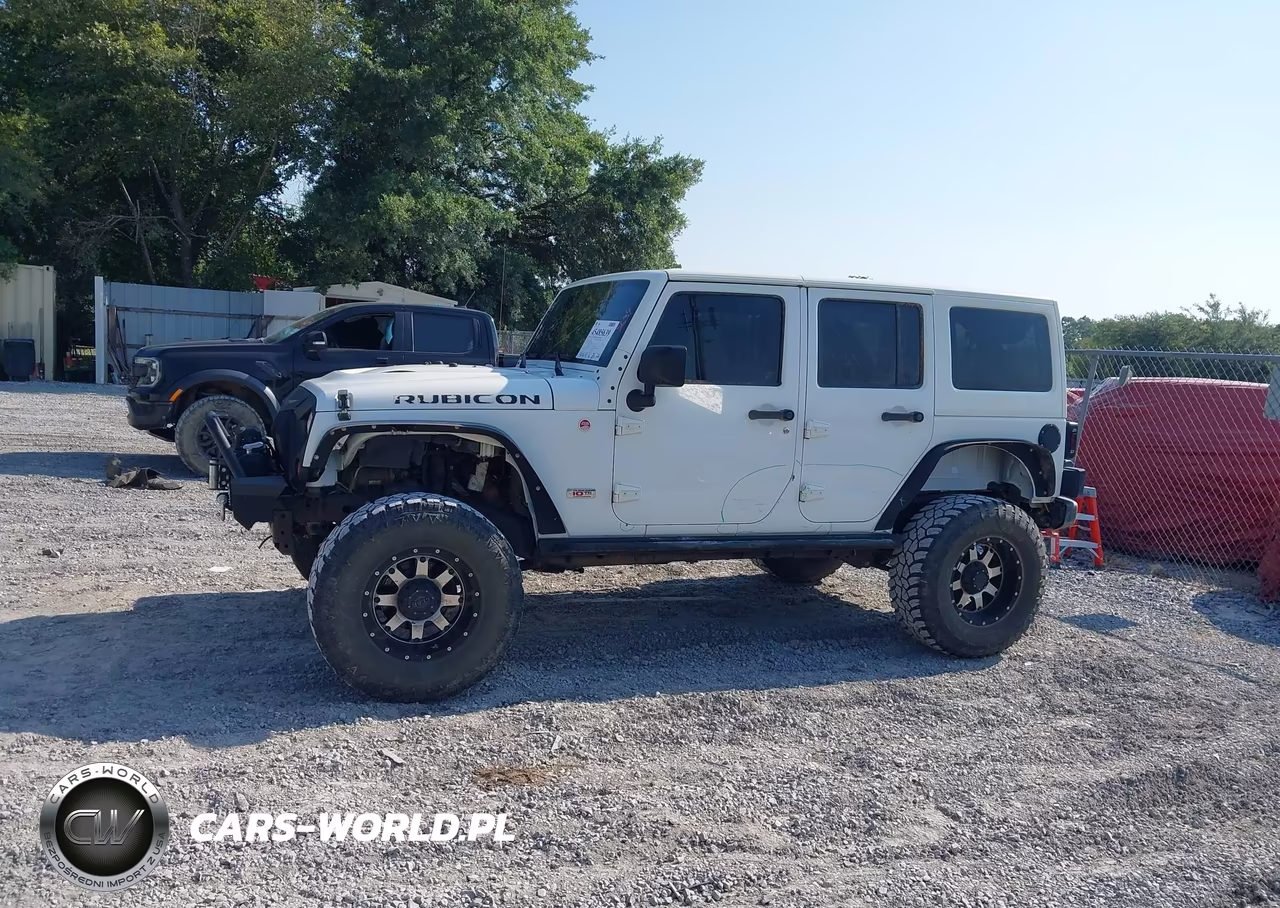 2013 Jeep Wrangler Unlimited Rubicon 10Th Anniversary VIN:1C4BJWFG0DL664087 - 14