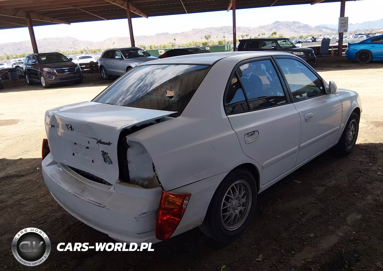 2005 Hyundai Accent Gls VIN:KMHCG45C35U585347 - 12