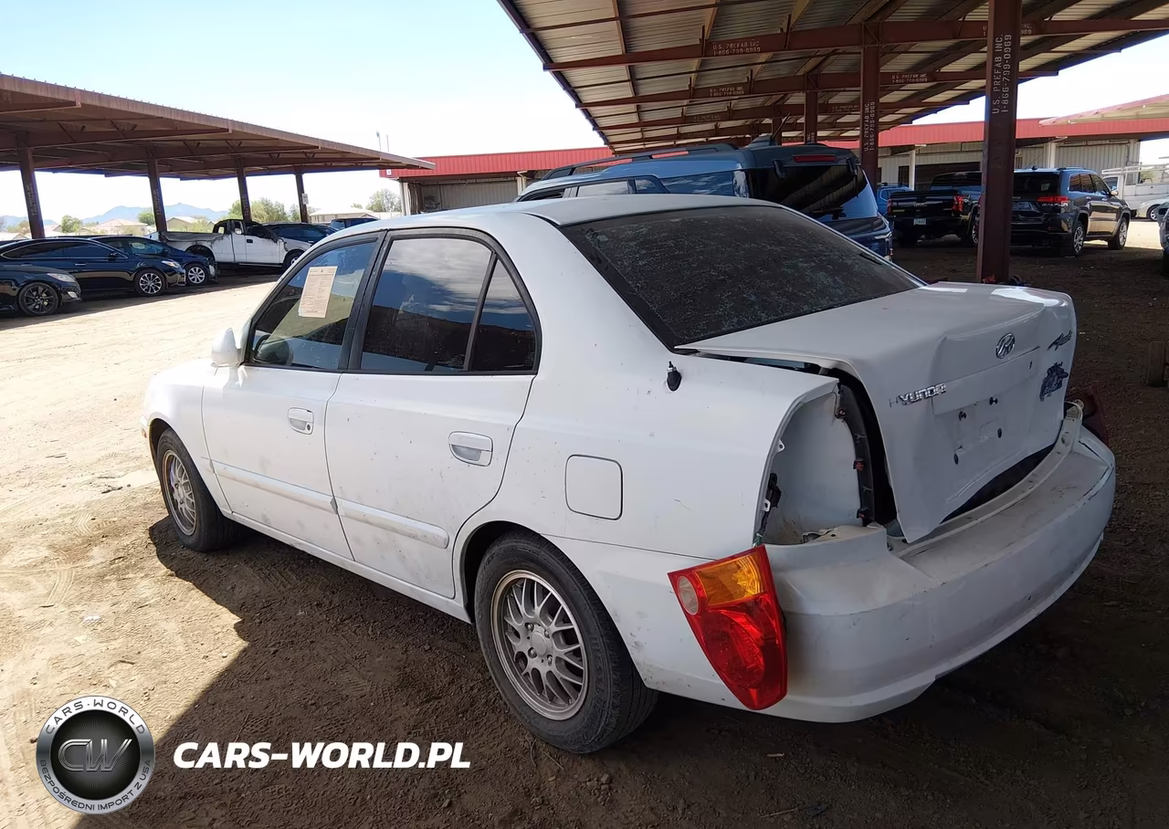 2005 Hyundai Accent Gls VIN:KMHCG45C35U585347 - 13