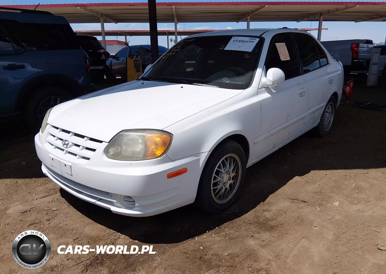 2005 Hyundai Accent Gls VIN:KMHCG45C35U585347 - 14