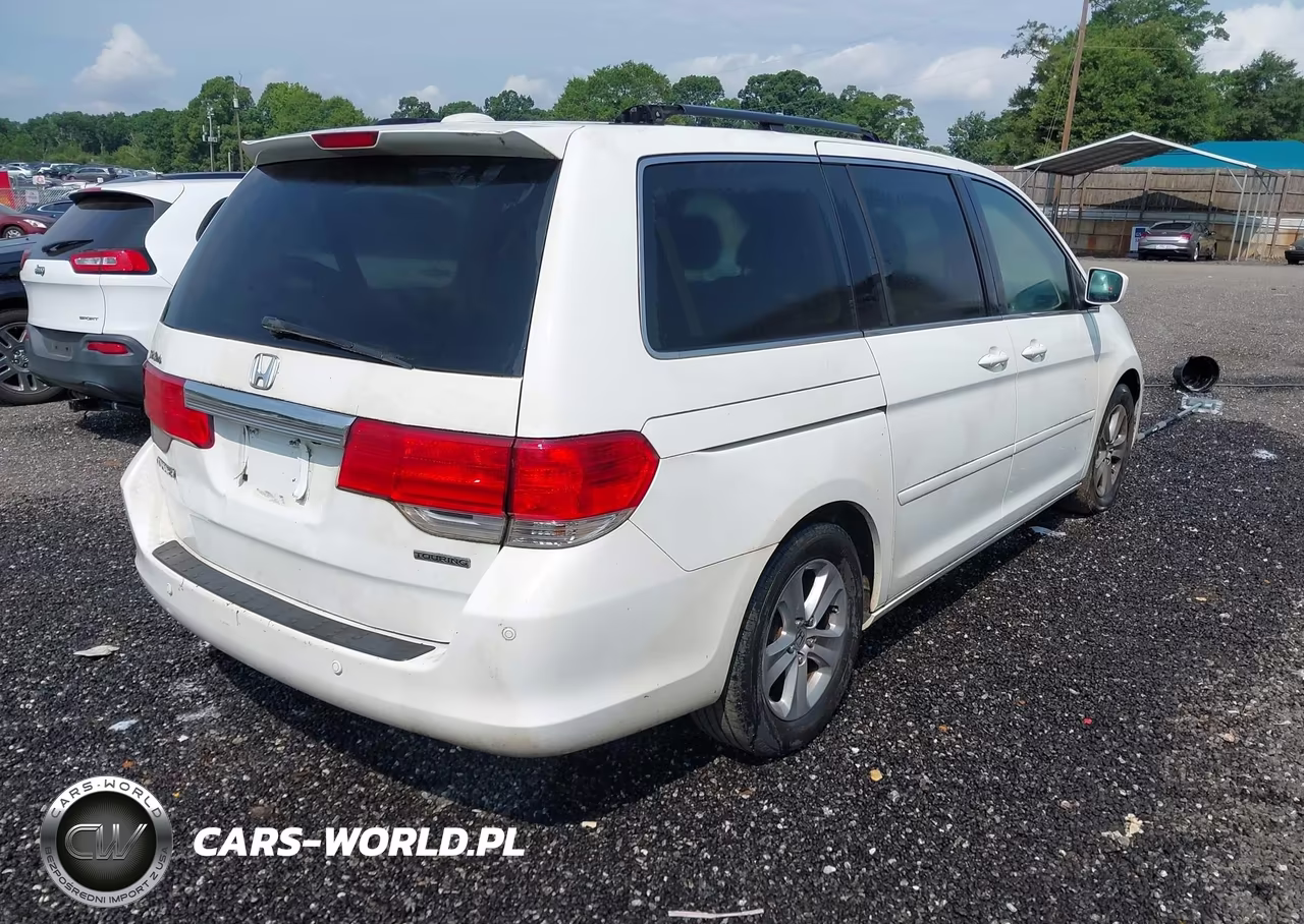 2010 Honda Odyssey Touring VIN:5FNRL3H9XAB055450 - 4