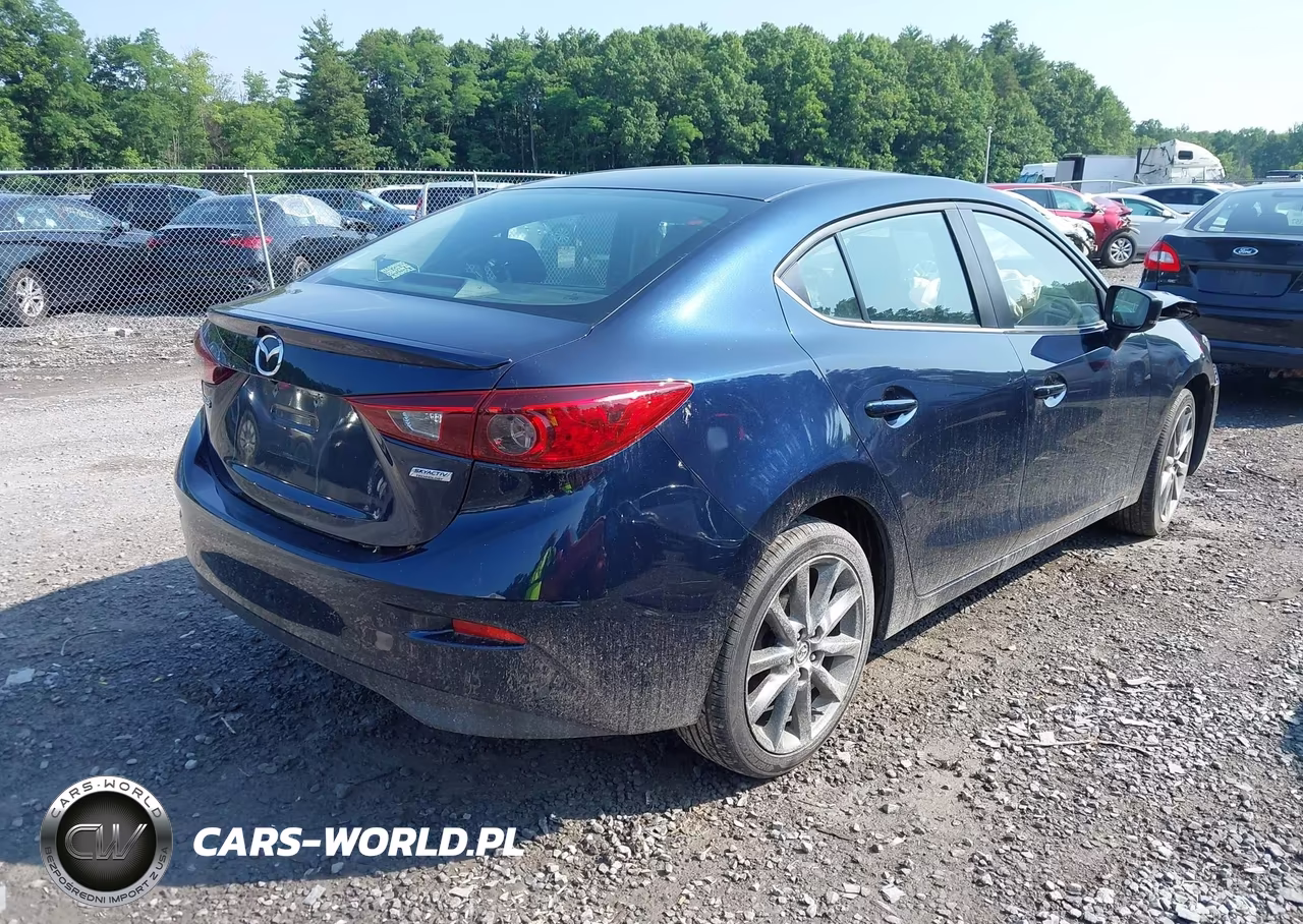 2018 Mazda Mazda3 Touring VIN:3MZBN1V36JM265519 - 4