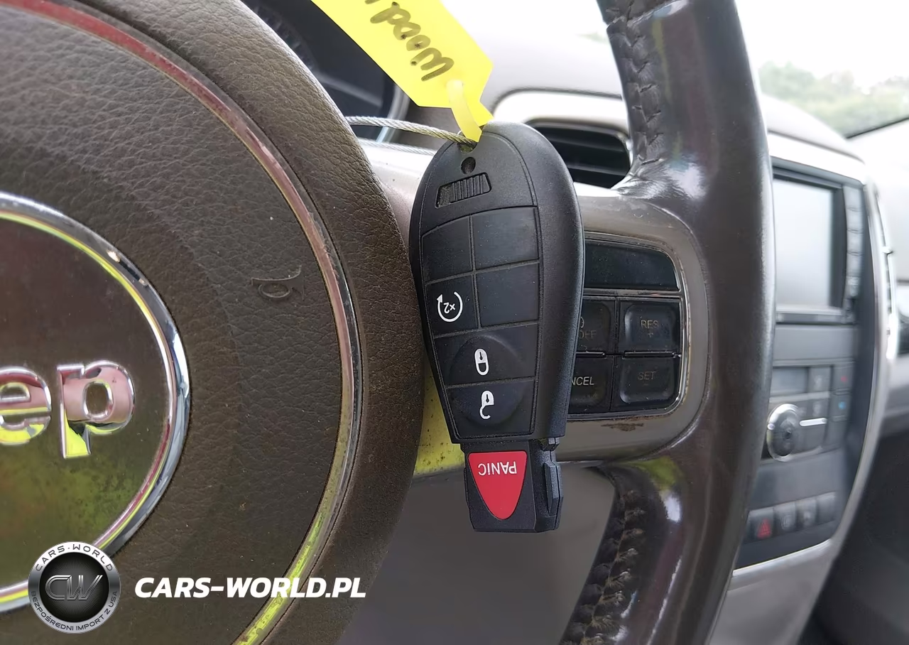 2012 Jeep Grand Cherokee Laredo VIN:1C4RJFAG6CC318694 - 11