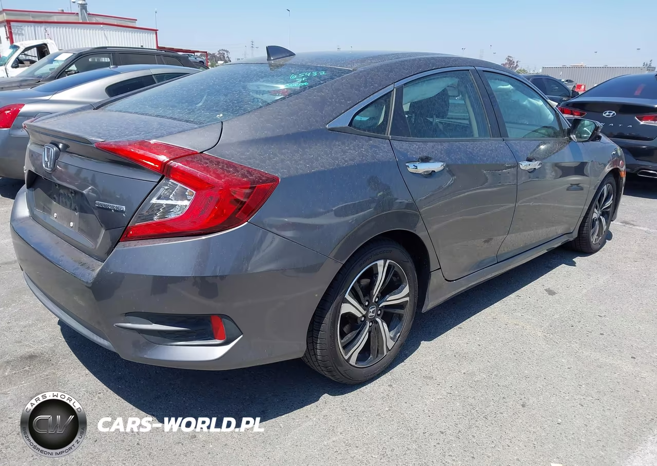 2016 Honda Civic Touring VIN:2HGFC1F97GH635074 - 4