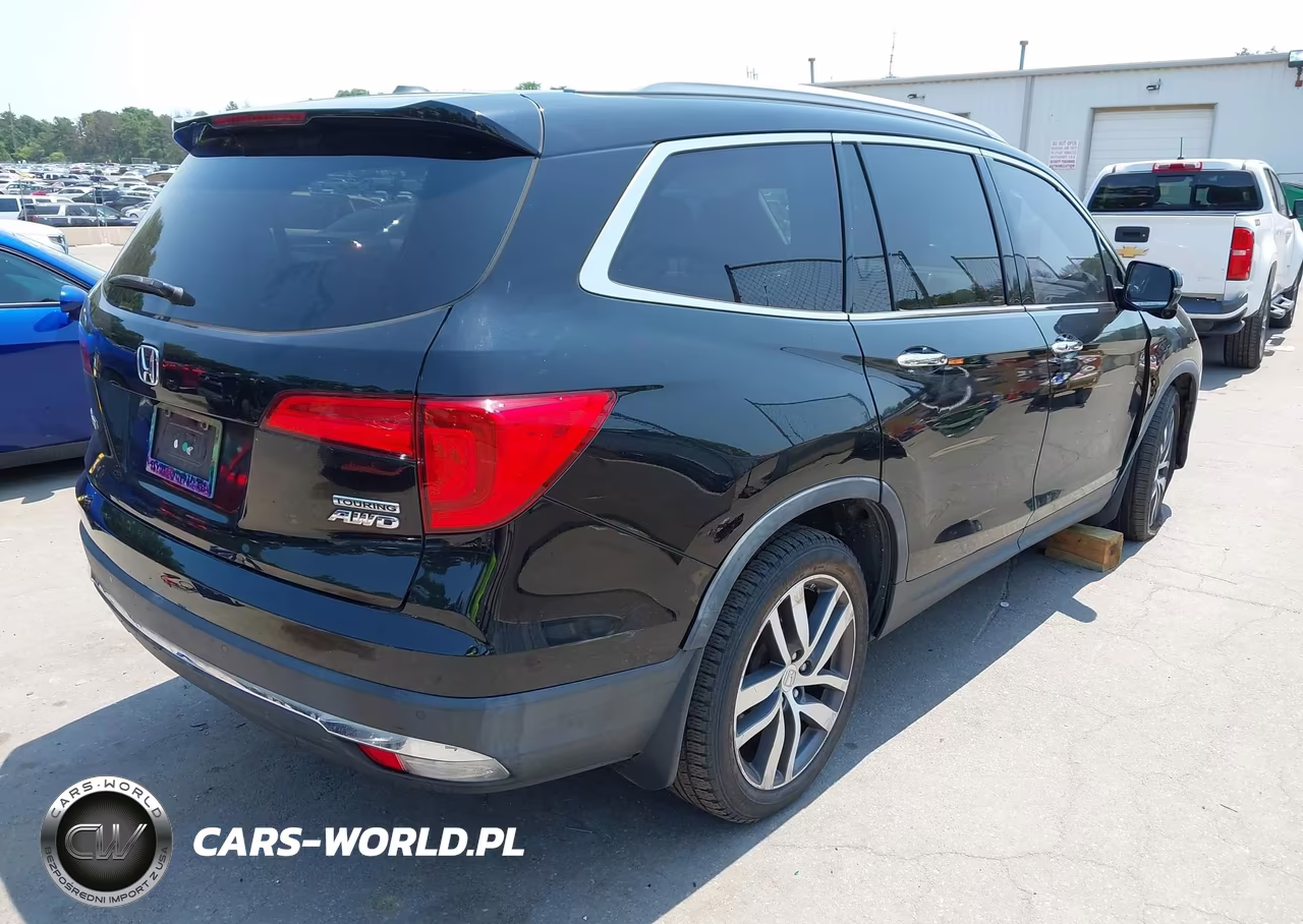 2017 Honda Pilot Touring VIN:5FNYF6H99HB011504 - 4