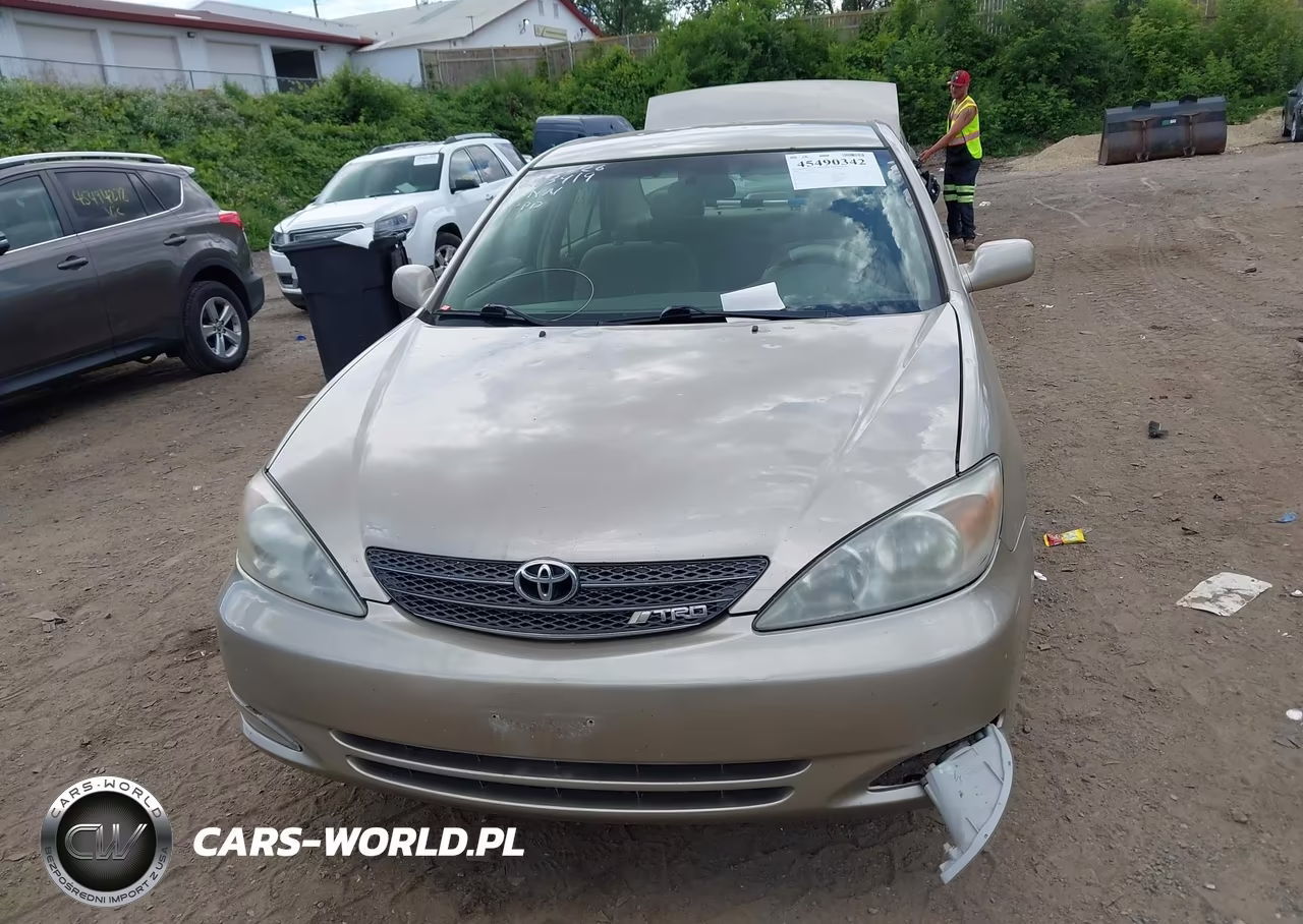 2003 Toyota Camry Le VIN:JTDBE32KX30203699 - 13