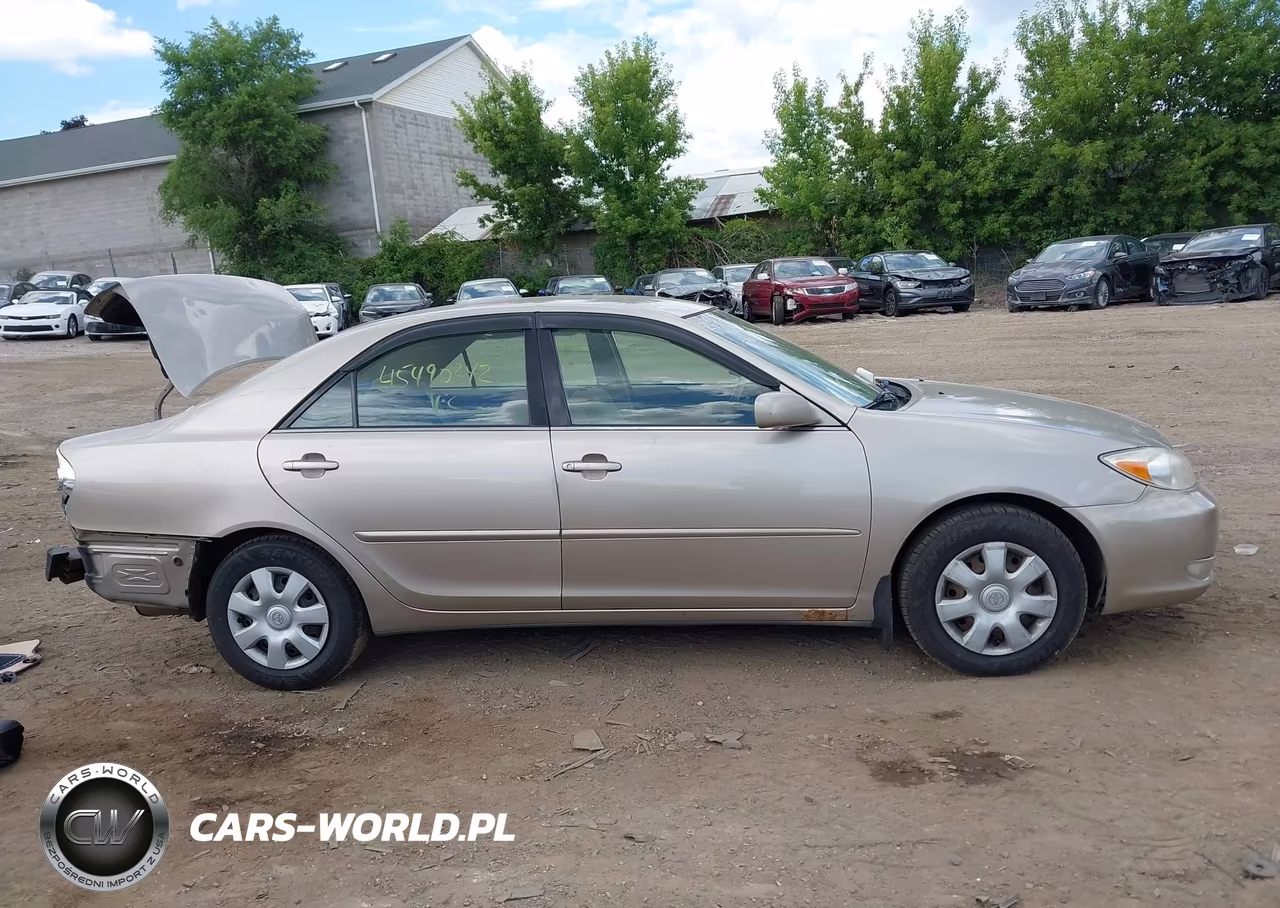 2003 Toyota Camry Le VIN:JTDBE32KX30203699 - 14