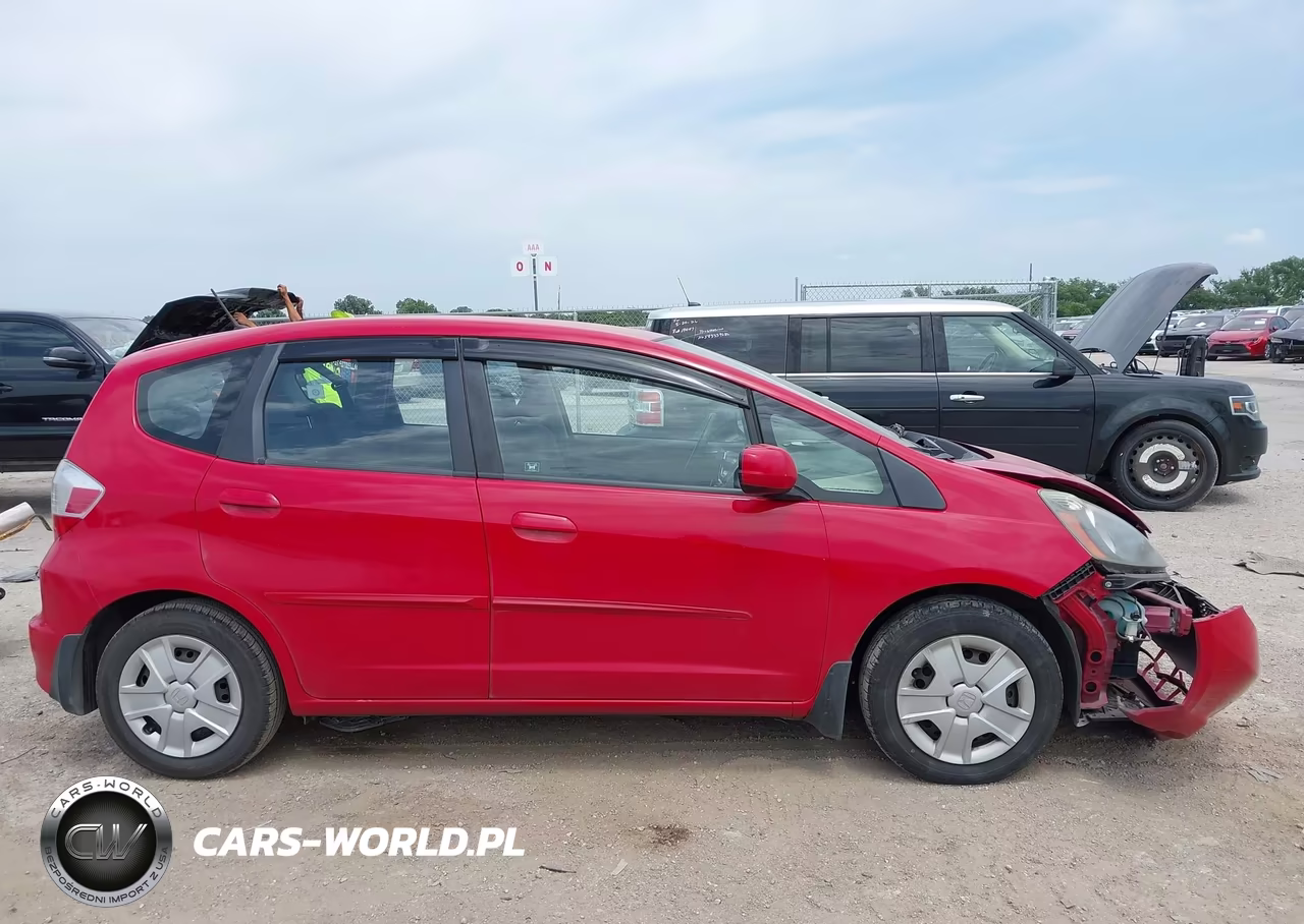 2012 Honda Fit VIN:JHMGE8H3XCC021128 - 13
