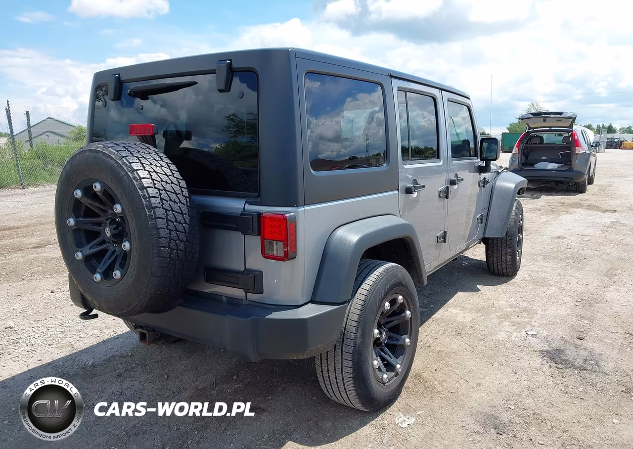 2013 Jeep Wrangler Unlimited Sport VIN:1C4BJWDG0DL631156 - 4
