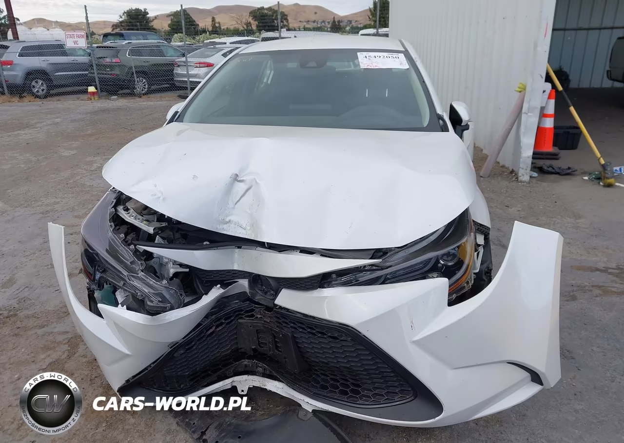 2022 Toyota Corolla Hybrid Le VIN:JTDEAMDE7NJ041100 - 12
