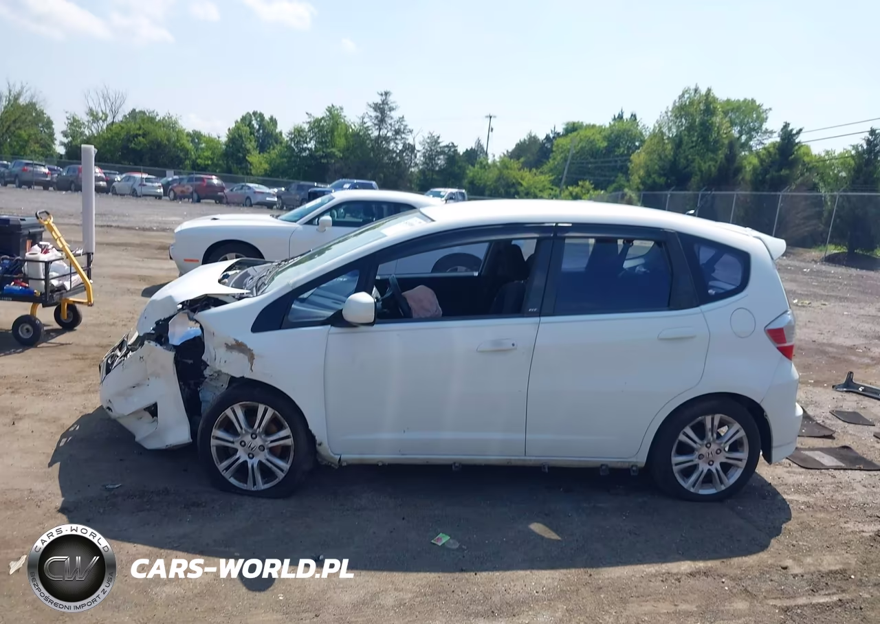 2009 Honda Fit Sport VIN:JHMGE88469C000424 - 15
