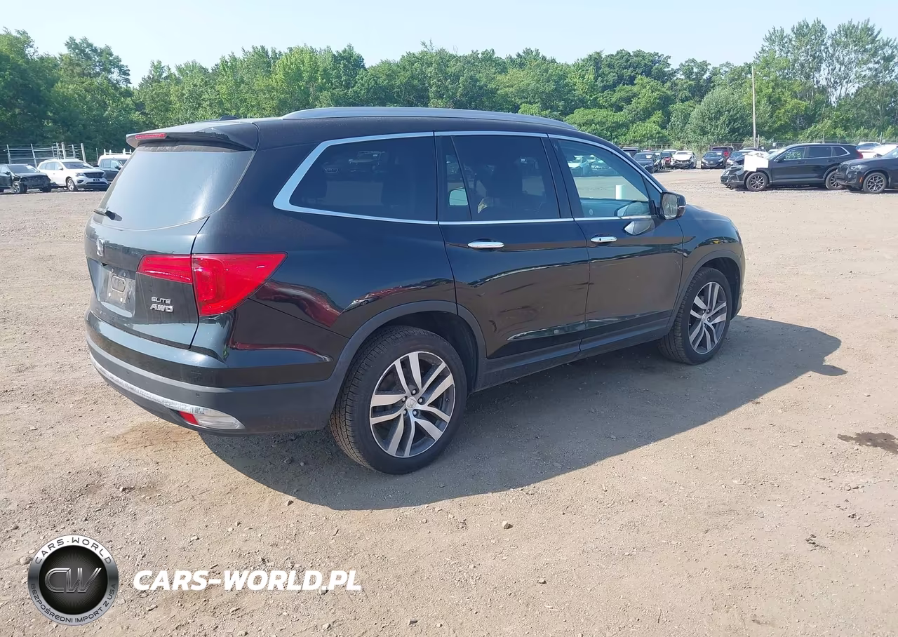 2018 Honda Pilot Elite VIN:5FNYF6H01JB033889 - 4