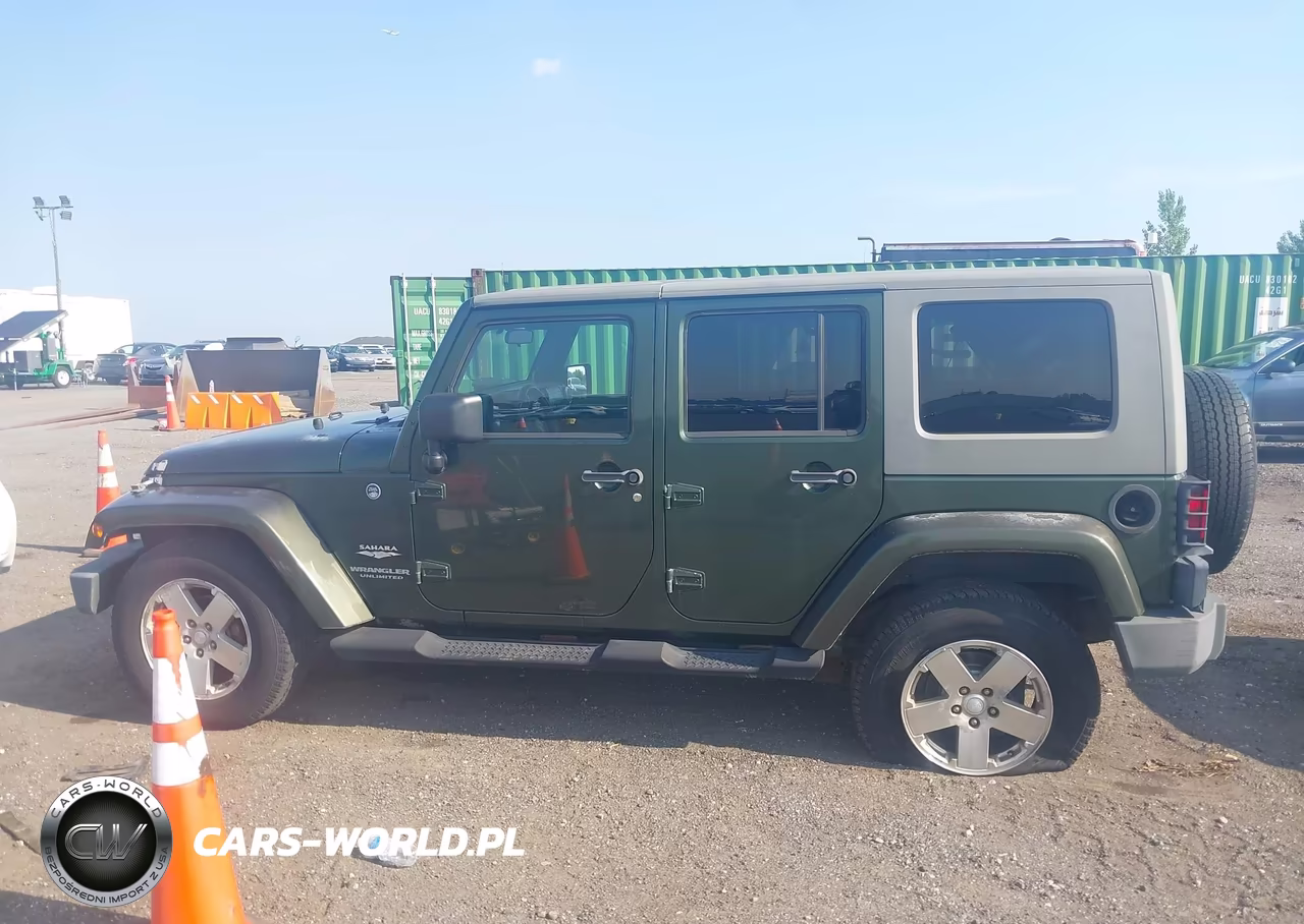 2008 Jeep Wrangler Unlimited Sahara VIN:1J4GA59138L562290 - 14