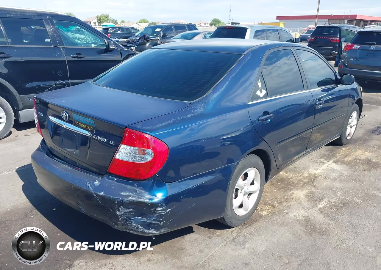 2002 Toyota Camry Le VIN:JTDBE32K220123652 - 4