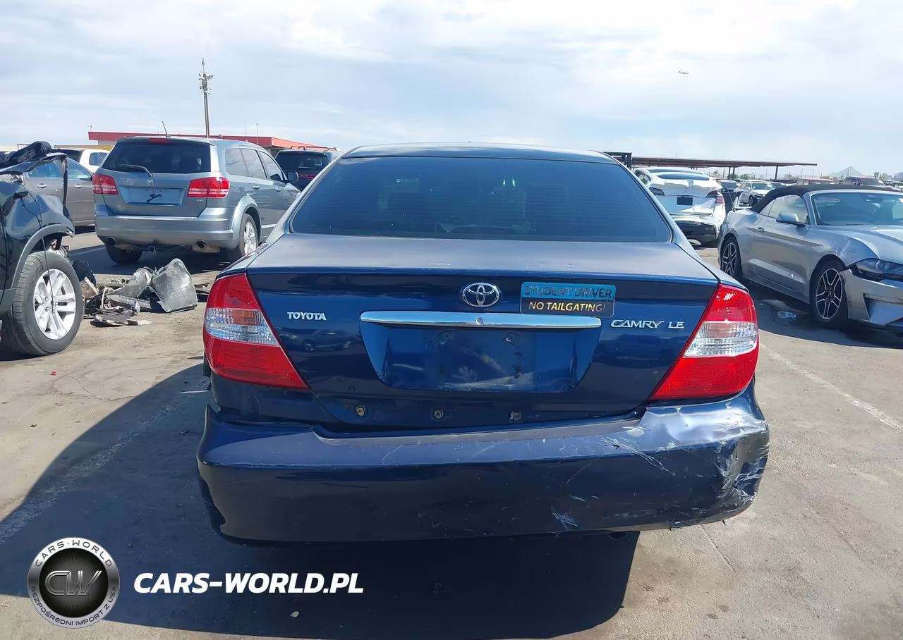 2002 Toyota Camry Le VIN:JTDBE32K220123652 - 6