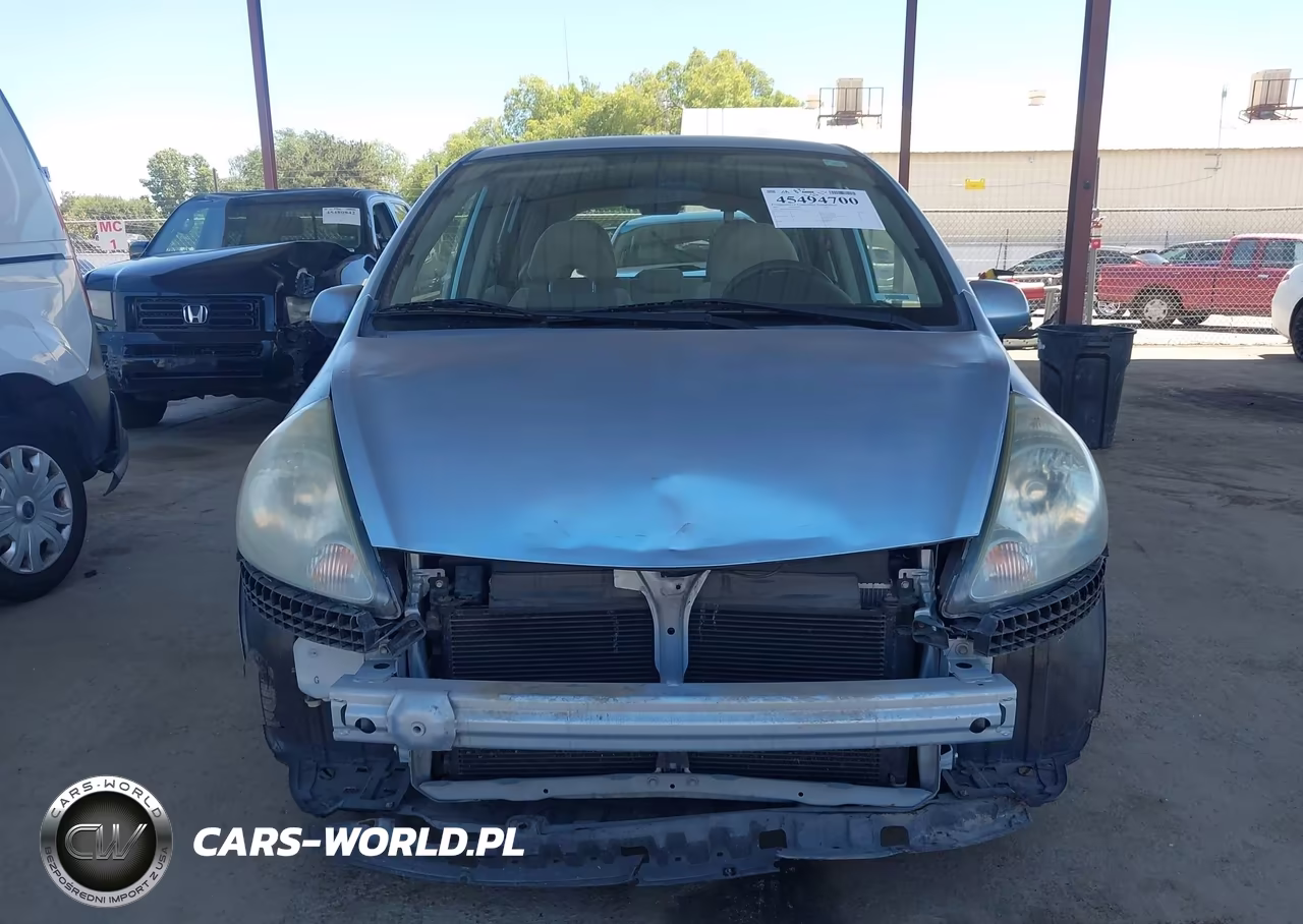 2007 Honda Fit VIN:JHMGD38477S010212 - 12