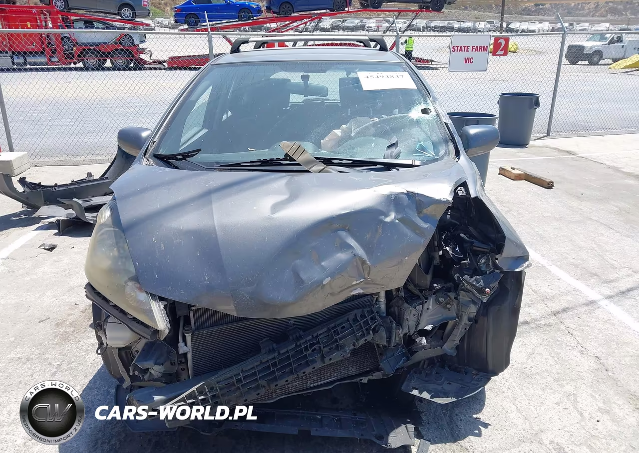 2012 Honda Fit VIN:JHMGE8H33CC023903 - 12