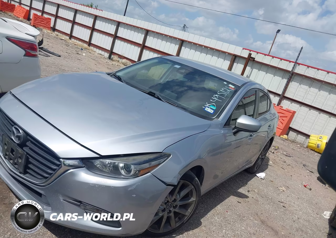 2018 Mazda Mazda3 Touring VIN:3MZBN1V32JM180015 - 14